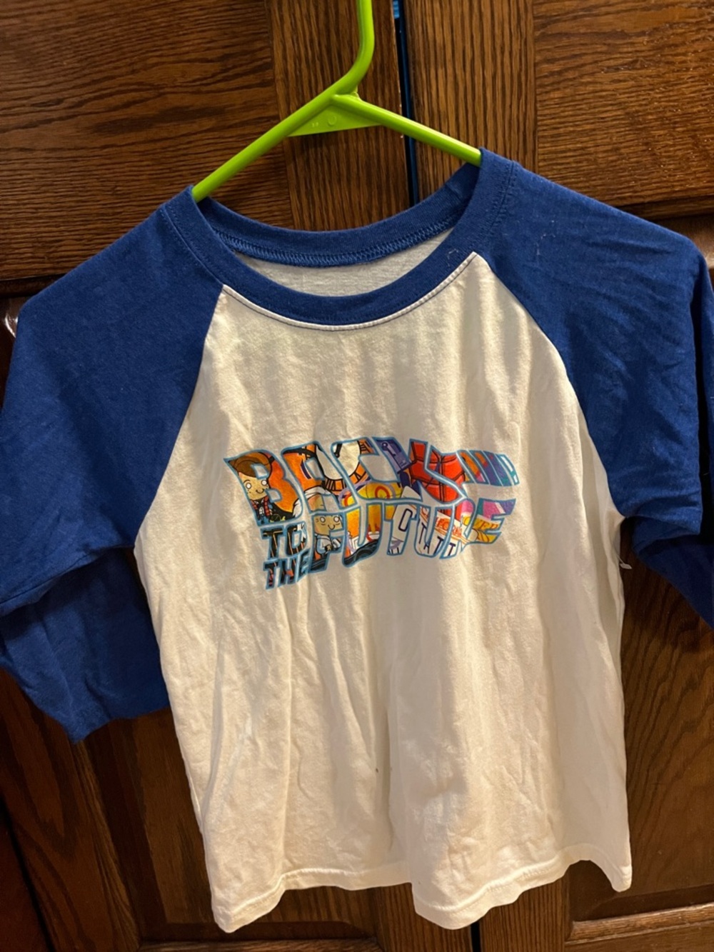 Universal Blue & White Raglan Tee with Colorful 'Back to the Future' Graphic